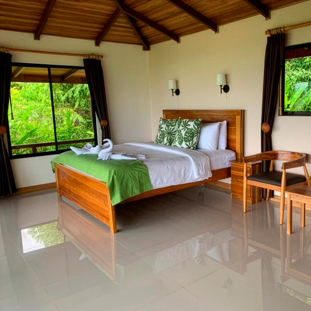eco‑lodge bedroom with swan towels in Drake Bay